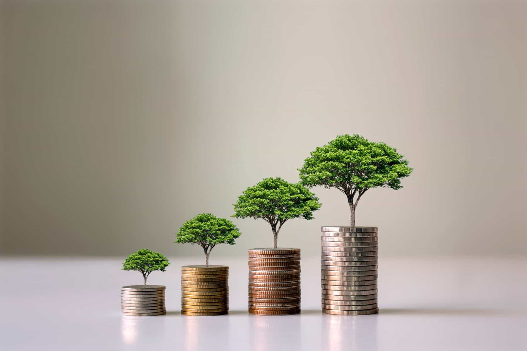 Coins with trees growing on them, graphic