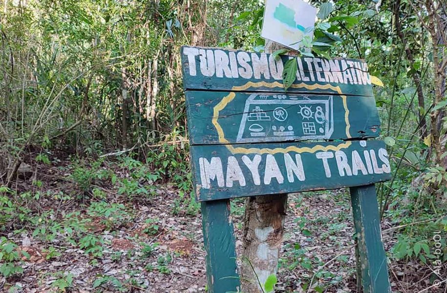 Sign reads: Turismo Alternativo Mayan Trails